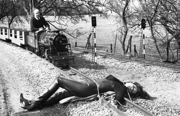 Diana Rigg tied to the tracks on the Stapleford House miniature railway