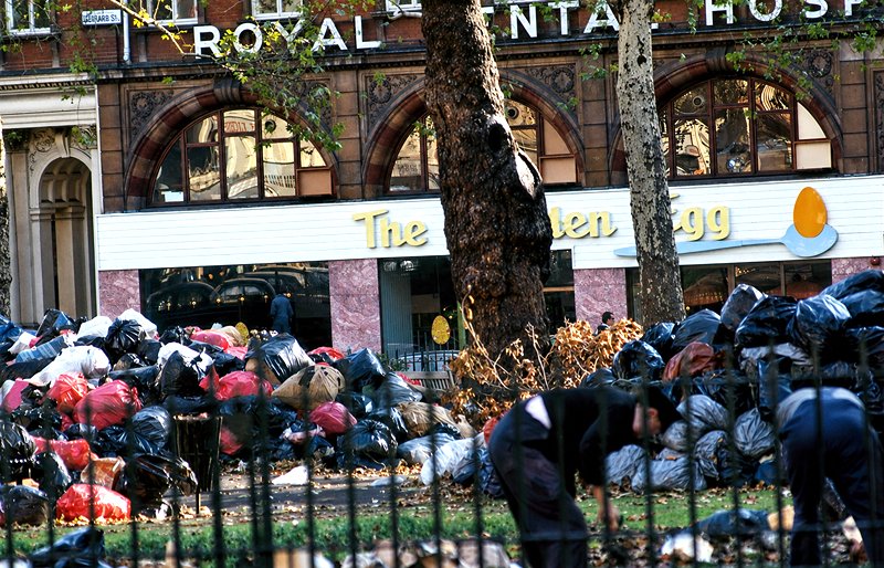 The Golden Egg in Leicester Square during the dustman's strike in 1970 with rubbish piled up outside