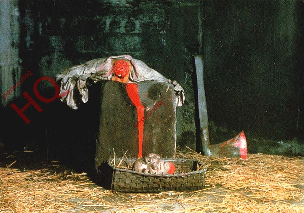 1980s postcard of the London Dungeon showing a beheading