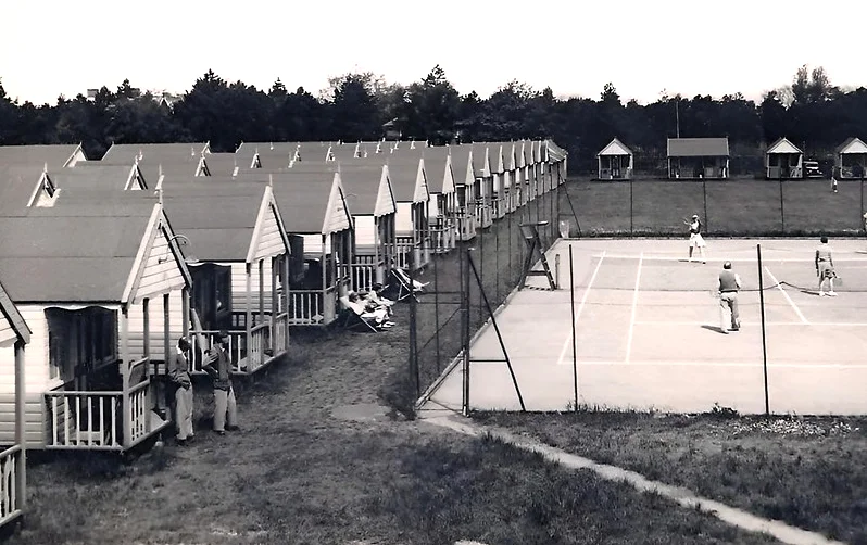 Vintage postcard of Seacroft holiday camp in Hemsby showing the tennis courts and chalets